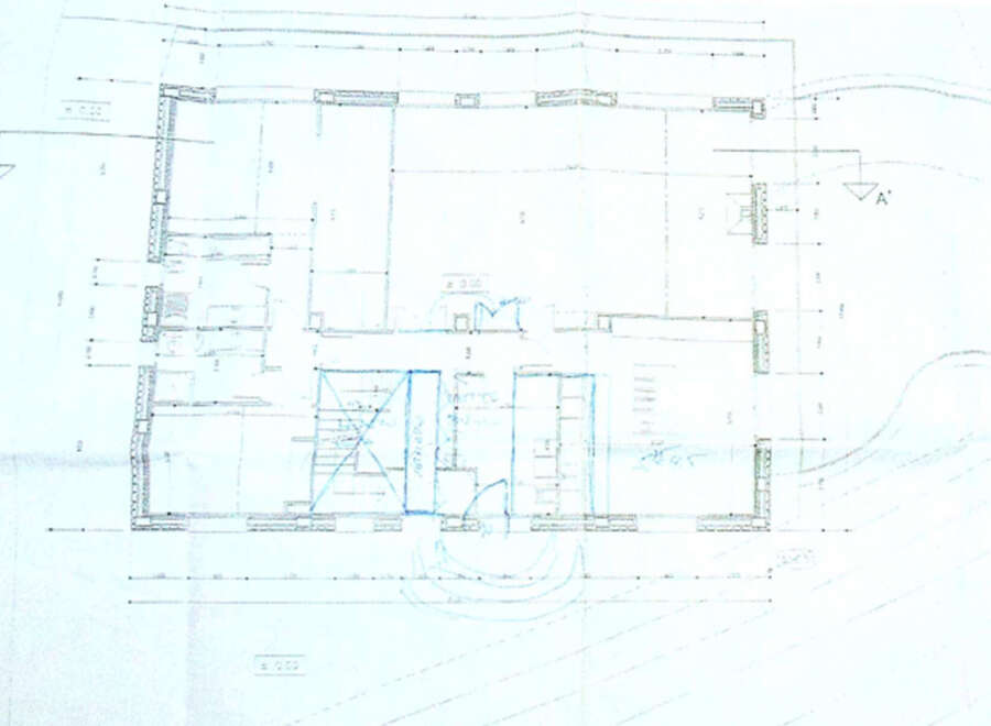 This architectural blueprint showcases a thoughtfully designed property featuring a spacious open-plan layout, complemented by well-defined rooms and ample outdoor space.