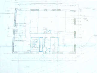 This architectural blueprint showcases a thoughtfully designed property featuring a spacious open-plan layout, complemented by well-defined rooms and ample outdoor space.