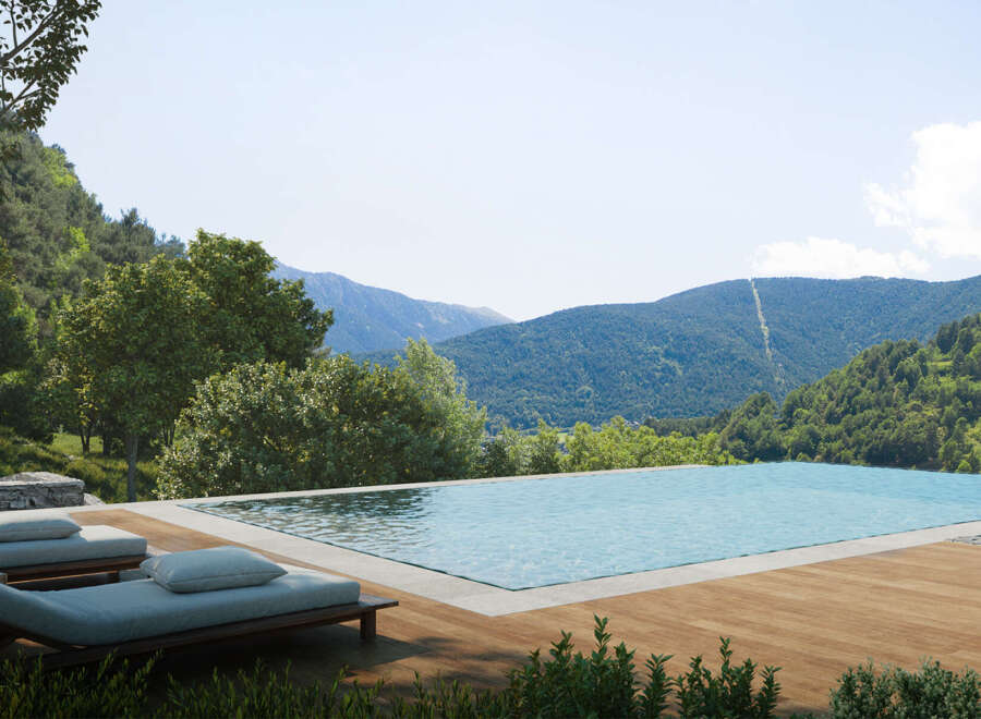 Luxury mountain retreat with infinity pool offering breathtaking panoramic views.