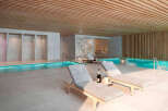 Indulge in luxury at this stunning property featuring a tranquil indoor pool and spa.