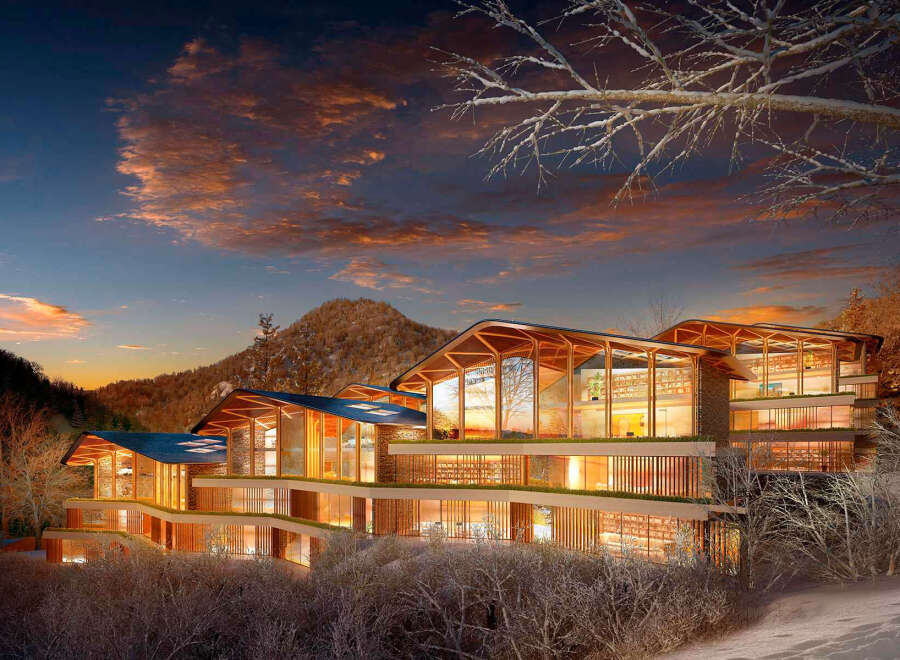 Luxury mountain retreat nestled in a snowy landscape.