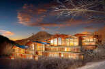 Luxury mountain retreat nestled in a snowy landscape.