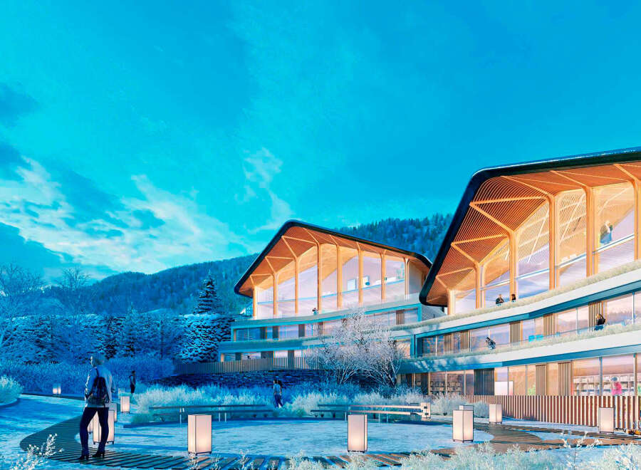 Luxury apartments nestled in a snowy mountainside setting.