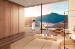 Wake up to breathtaking mountain views from this luxurious bedroom.