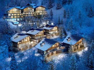 Luxury ski-in/ski-out chalets nestled in a snowy mountainside, offering breathtaking views and modern amenities.