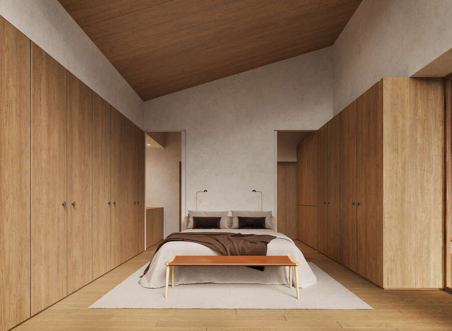This stunning bedroom boasts a minimalist design with built-in wooden wardrobes, creating ample storage space.