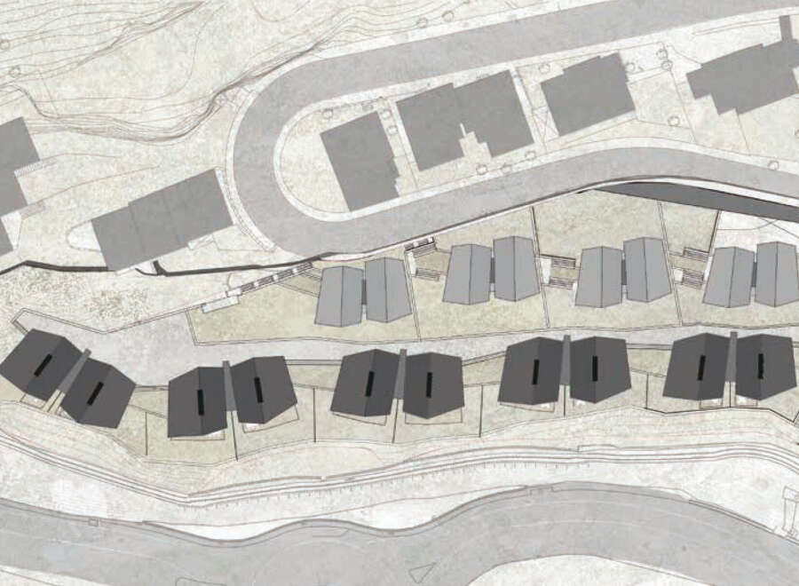 This stunning property boasts a unique architectural design, featuring a cluster of modern homes nestled into a hillside setting.
