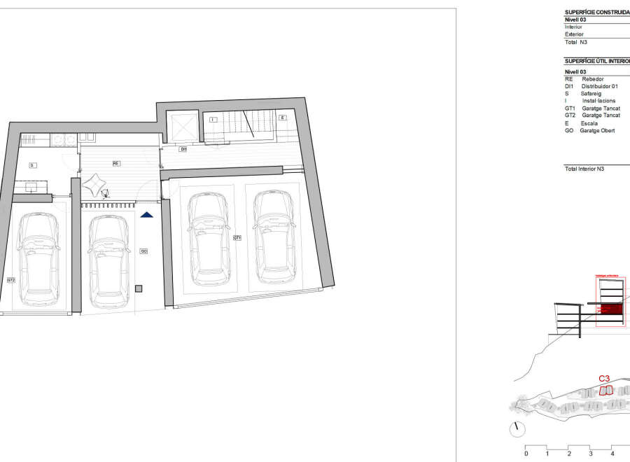 This is a blueprint showcasing a level of a property with multiple parking spaces, including both enclosed garages (Garatge Tancat) and an open garage (Garatge Obert).