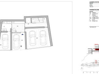 This is a blueprint showcasing a level of a property with multiple parking spaces, including both enclosed garages (Garatge Tancat) and an open garage (Garatge Obert).