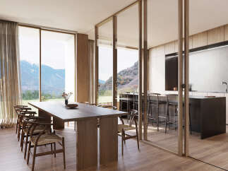 Stunning mountain views from this modern home's open-concept dining area.