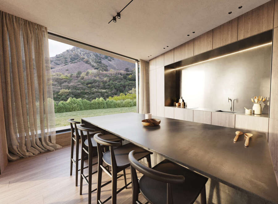 Modern kitchen with stunning mountain views.