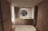 Luxurious bathroom with a freestanding bathtub and double vanity.