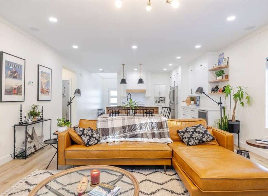 Step into luxury with this stunning property! Featuring a spacious open-concept living area, perfect for entertaining.
