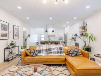 Step into luxury with this stunning property! Featuring a spacious open-concept living area, perfect for entertaining.