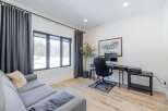 Discover the perfect blend of comfort and functionality in this stunning home office.