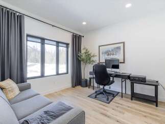 Discover the perfect blend of comfort and functionality in this stunning home office.