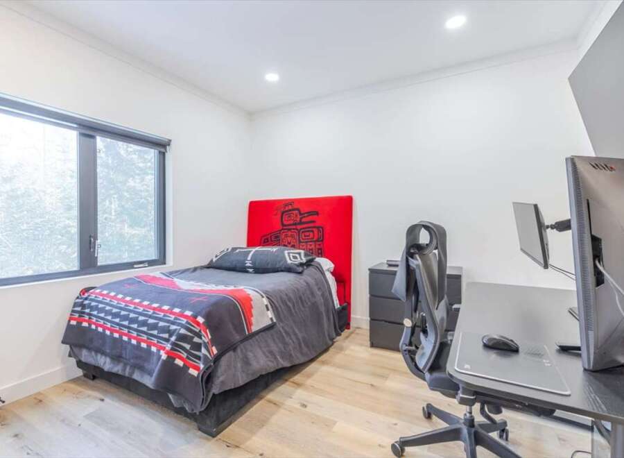 Discover a modern bedroom with a sleek design.