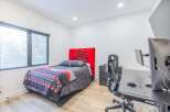 Discover a modern bedroom with a sleek design.