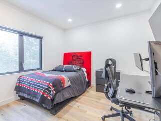 Discover a modern bedroom with a sleek design.