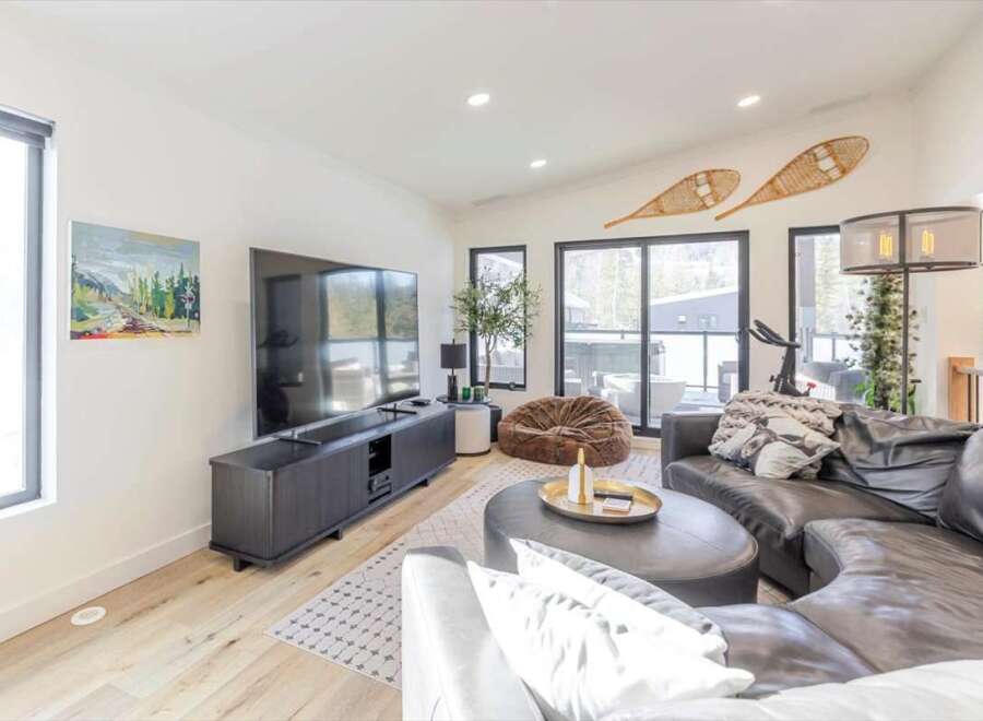 Step into luxury with this stunning living space, featuring a sleek, modern design.