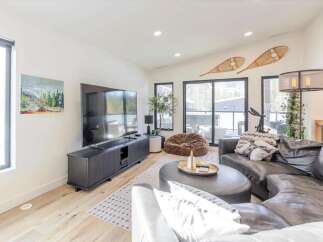 Step into luxury with this stunning living space, featuring a sleek, modern design.