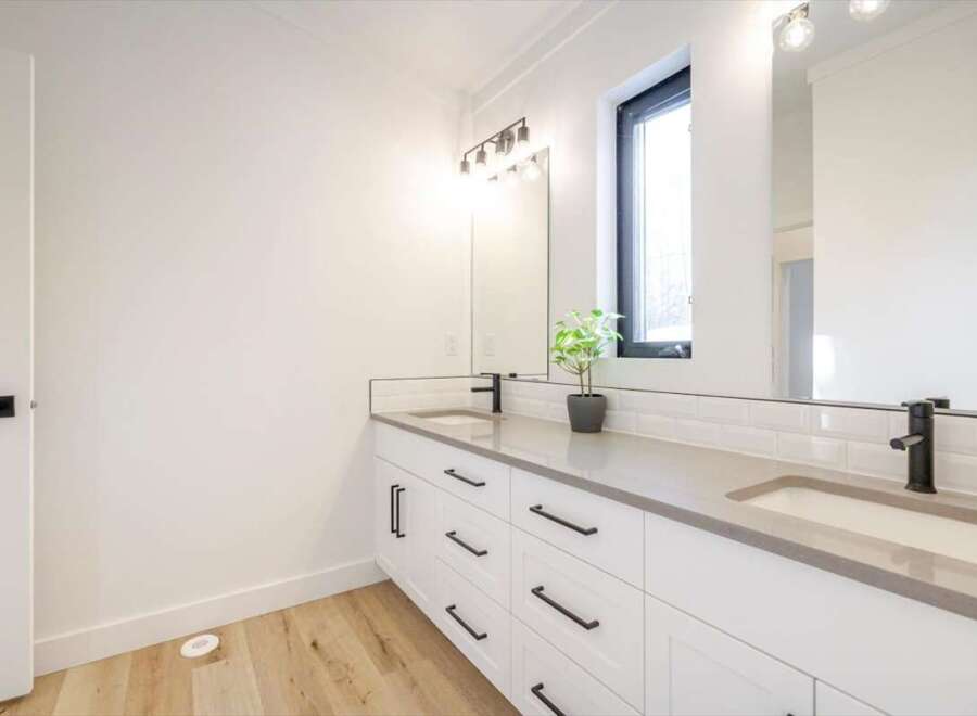 This modern bathroom boasts a sleek design with a bright and airy feel.