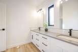 This modern bathroom boasts a sleek design with a bright and airy feel.
