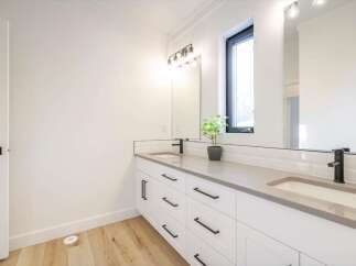This modern bathroom boasts a sleek design with a bright and airy feel.