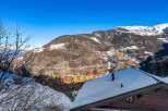 Experience the charm of a snow-covered chalet nestled in the heart of the mountains.