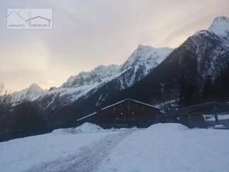 Discover a stunning mountain retreat nestled amidst breathtaking alpine scenery.