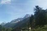 Discover a stunning property nestled amidst breathtaking mountain scenery.