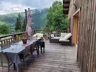 Enjoy breathtaking mountain views from this charming property.