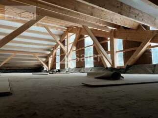 Discover the potential of this spacious attic, perfect for renovation.