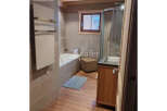 Discover a charming bathroom with a modern touch.