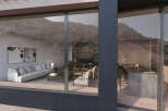 Mountain view home with floor to ceiling windows showcasing the open concept living space.