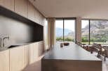 Modern kitchen with stunning mountain views.