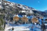 Luxury apartments nestled in the French Alps, offering breathtaking mountain views and ski-in/ski-out access.