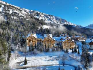 Luxury apartments nestled in the French Alps, offering breathtaking mountain views and ski-in/ski-out access.