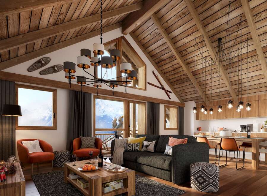 This stunning chalet boasts a spacious open-plan living area with vaulted wooden ceilings and large windows offering breathtaking mountain views.