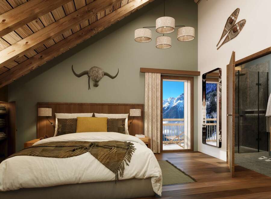 Luxury chalet bedroom with stunning mountain views.