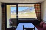 Enjoy breathtaking mountain views from this charming property.