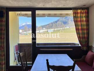 Enjoy breathtaking mountain views from this charming property.