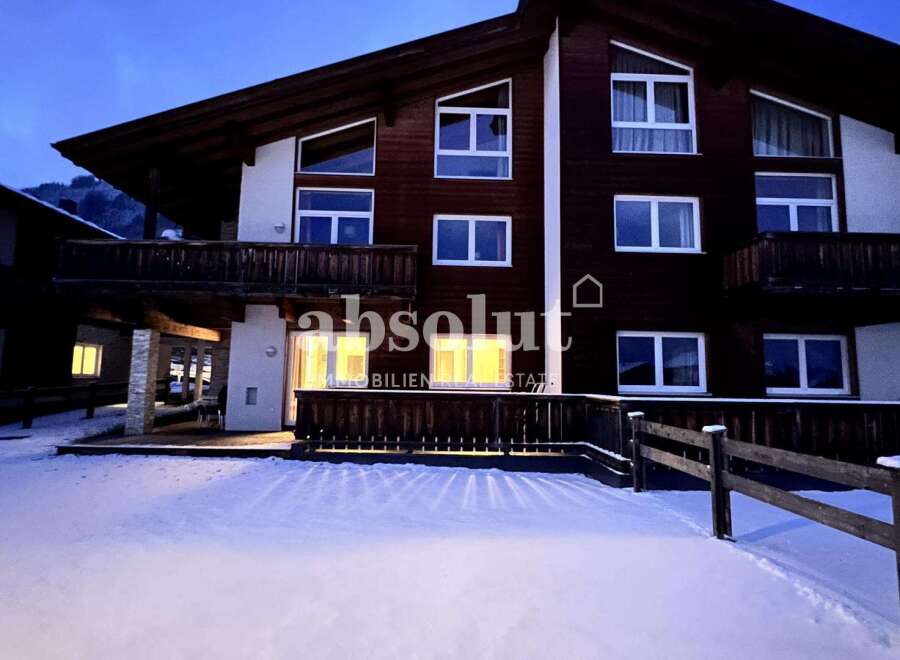 Discover a stunning chalet nestled in a winter wonderland.