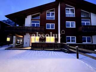 Discover a stunning chalet nestled in a winter wonderland.