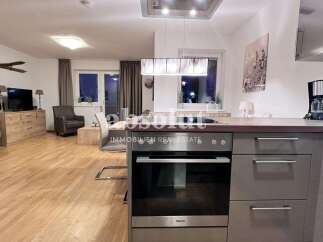 Discover modern living in this stylish property! Featuring a sleek kitchen with high-end appliances, perfect for culinary enthusiasts.