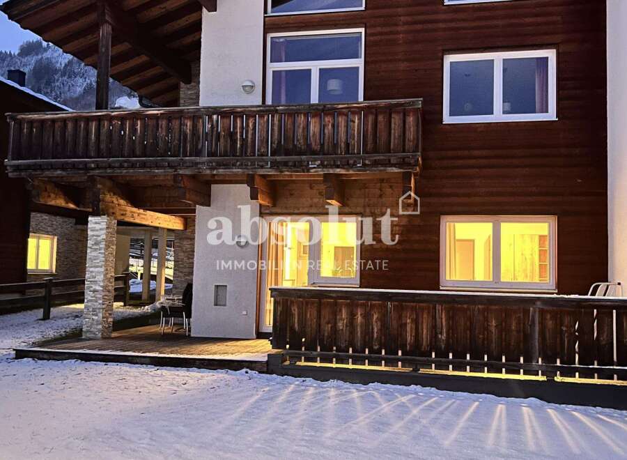 Discover the charm of this stunning property, featuring a beautiful wooden facade and inviting balconies.