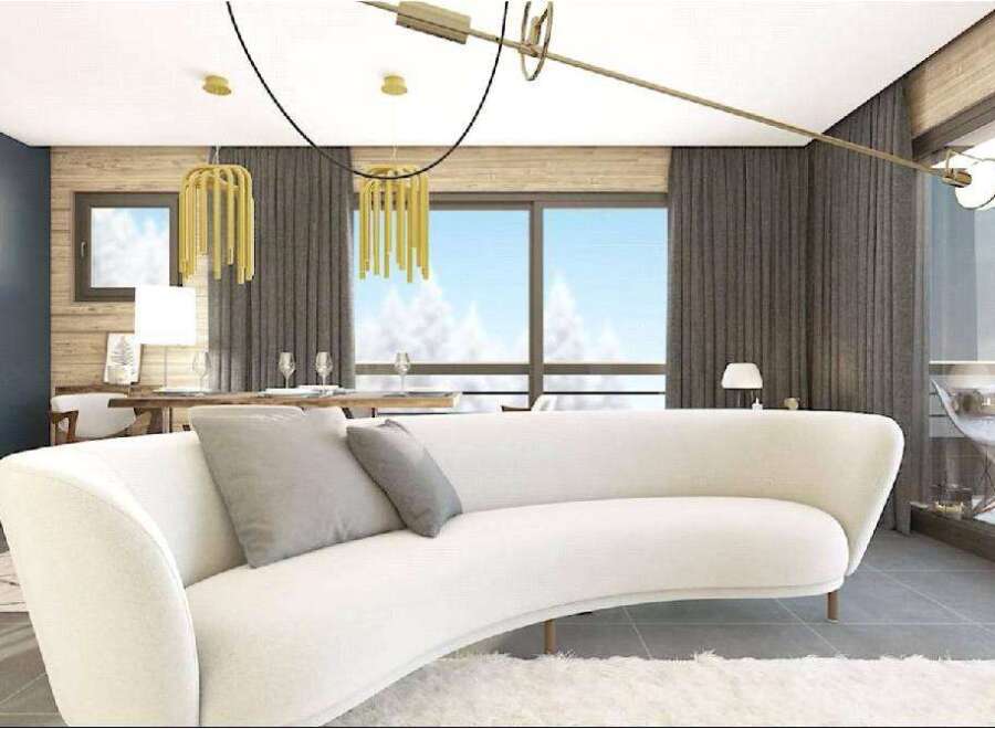 Stunning apartment boasts a modern, open-plan living area with a curved sofa and large windows offering breathtaking views.