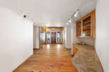 This stunning property boasts a spacious, open-concept floor plan with gleaming hardwood floors throughout.