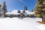 This stunning mountain home boasts a spacious layout, perfect for families or groups.
