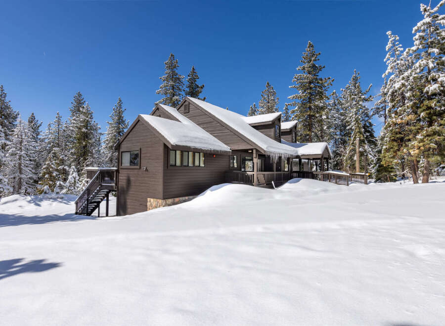 This stunning mountain home boasts a spacious layout, perfect for families or groups.